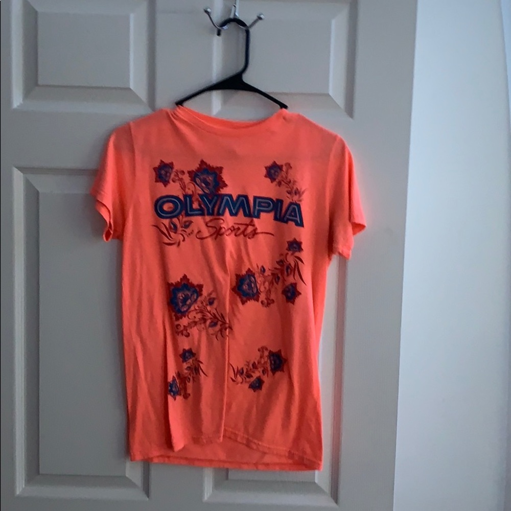 A Olympia orange shirt with blue and maroon flower